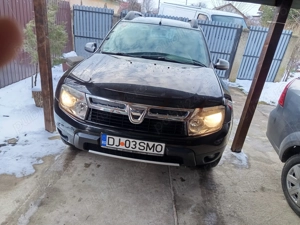 Dacia Duster 1.6 gpl - imagine 4