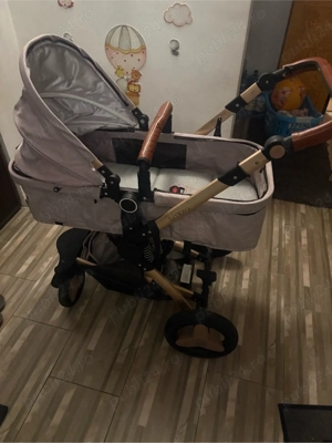 Carut cu landou si scoica