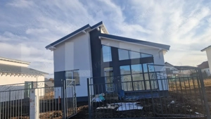 Casa Harman individuala , 500 mp teren , moderna, intabulata toate utilitatiile