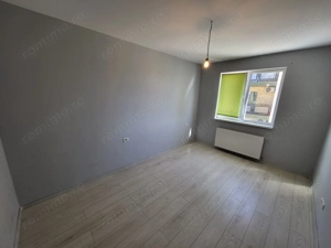 Bloc Nou. Etaj 1. Decomandat. Bucatarie inchisa. Asfalt. Transport in comun. - imagine 11