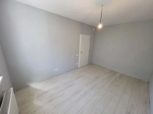 Bloc Nou. Etaj 1. Decomandat. Bucatarie inchisa. Asfalt. Transport in comun. - imagine 9