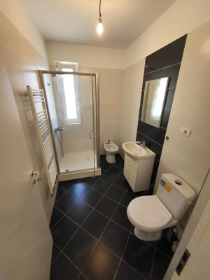 Bloc Nou. Etaj 1. Decomandat. Bucatarie inchisa. Asfalt. Transport in comun. - imagine 10