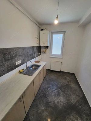 Bloc Nou. Etaj 1. Decomandat. Bucatarie inchisa. Asfalt. Transport in comun. - imagine 6