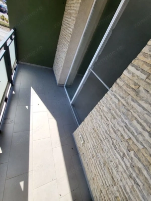 Bloc Nou. Etaj 1. Decomandat. Bucatarie inchisa. Asfalt. Transport in comun. - imagine 5