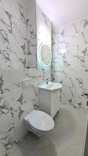 102mp din care: 54 mp este livingul iar 48 mp doua dormitoare si cele doua bai. Pret 119.900 Euro - imagine 9