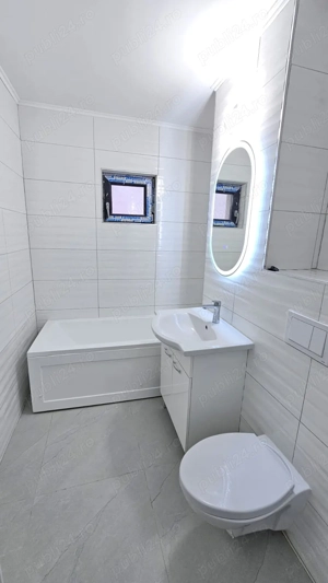 102mp din care: 54 mp este livingul iar 48 mp doua dormitoare si cele doua bai. Pret 119.900 Euro - imagine 10