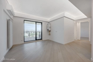 Apusul de la ultimul etaj din Cortina North | 3 camere | 76.7 mp - imagine 6