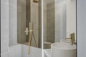 Apusul de la ultimul etaj din Cortina North | 3 camere | 76.7 mp - imagine 5