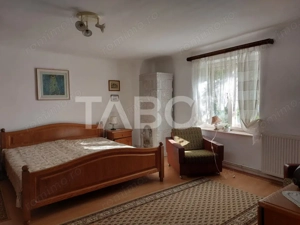 Casa de vanzare cu 2 apartamente separate si teren 500 mp Cisnadioara