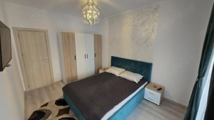 Proprietar Închirierez apartament 2 cam Esso | Bloc nou - imagine 4