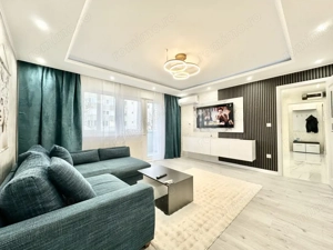 Apartament cu 3 camere - mobilat si utilat - etaj intermediar - zona Dambovita - imagine 2