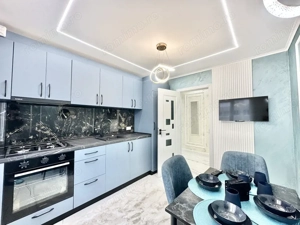 Apartament cu 3 camere - mobilat si utilat - etaj intermediar - zona Dambovita - imagine 7