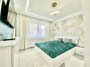 Apartament cu 3 camere - mobilat si utilat - etaj intermediar - zona Dambovita - imagine 5