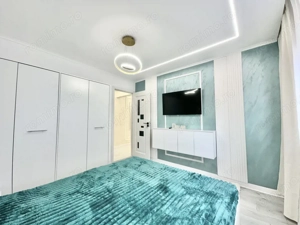 Apartament cu 3 camere - mobilat si utilat - etaj intermediar - zona Dambovita - imagine 4