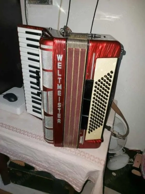 vând acordeon weltmeister  amigo