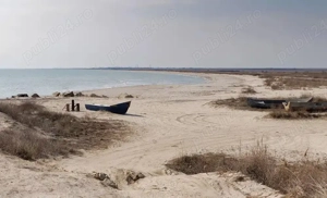 Teren de vanzare Vadu, prima linie 5000mp - drum de acces pe plaja