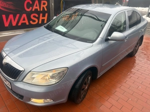 Skoda Octavia 1,9 TDI 2010 - imagine 4