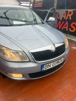 Skoda Octavia 1,9 TDI 2010 - imagine 6