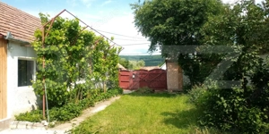  Casă de vânzare în comuna Homorod – liniște, confort și natură  - imagine 16