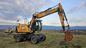 Excavator pe roți JCB 145 W - imagine 10