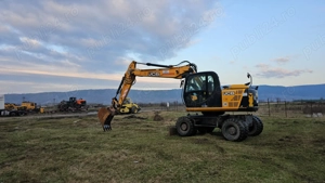 Excavator pe roți JCB 145 W - imagine 8