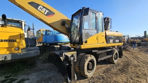 Excavator pe roti Caterpillar CAT M322 D - imagine 4