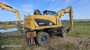 Excavator pe roți Caterpillar CAT M318  - imagine 2