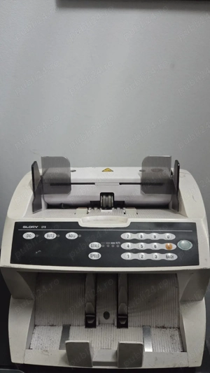 Masina de numarat Bani