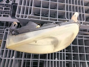 Far stânga opel corsa c 2005 - imagine 2