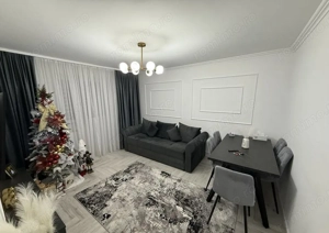  Apartament de vanzare 3 camere decomandat Et 2 Zona Hermes Rm Valcea 