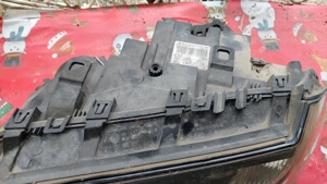 Far de BMW X3 2008 și volan  - imagine 4