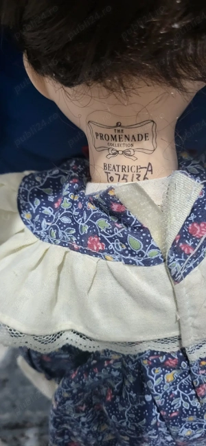 păpușa portelan 150lei