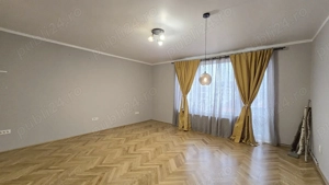 Zona Centrala, apartament 3 camere, cu boxa si garaj.