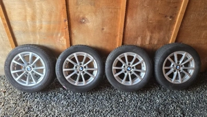 Set jante BMW originale 16 cu anvelope Continental M + S  205/60 R16 - imagine 6