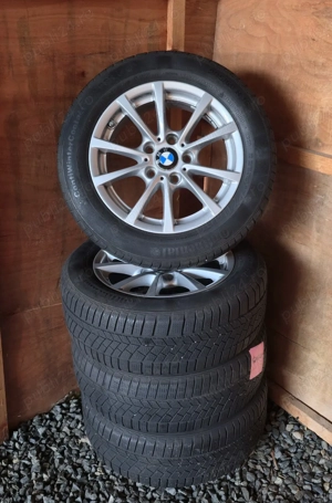 Set jante BMW originale 16 cu anvelope Continental M + S  205/60 R16 - imagine 8