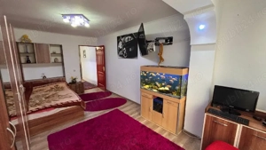 Garsonieră de vânzare si curte cu iesire la stradă - imagine 4