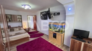 Garsoniera de vanzare 33mpu + parcare si curte privata