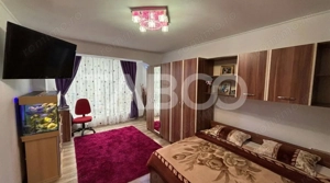 Garsoniera 33mpu de vanzare + parcare si curte privata