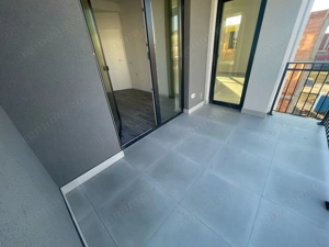 Bloc Nou. Decomandat. Etaj 1.Calea Timisorii . Asfalt. Transport in comun. - imagine 9