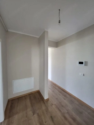 Bloc Nou. Decomandat. Etaj 1.Calea Timisorii . Asfalt. Transport in comun. - imagine 5