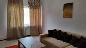 Închiriez apartament ultracentral,2 camere 75m decomandat. Bd.Ferdinand Teatrul Fantasio.Negociabil 