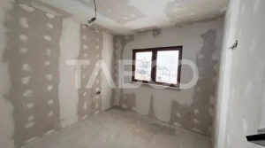 Casa de vanzare independenta energetic teren 550 mp zona  Sura Mare  - imagine 5