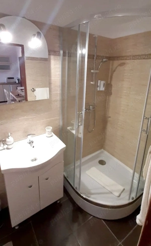 De vanzare casa cu trei apartamente separate amenajate si inchiriate in regim hotelier  - imagine 5