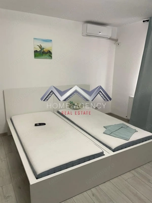 Garsonieră cu bucătărie închisă | include parcare