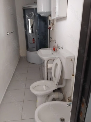 Spre vanzare casa demisol si parter decomandata garaj si teren - imagine 10