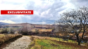 Teren intravilan 1.700 mp, front 68 m, zona Sopor