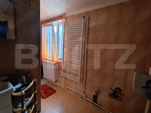 Casa cu 3 camere bucatarie si baie, suprafata utila 85 mp si un teren 600 mp - imagine 7