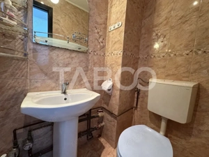 Apartament decomandat 3 camere 2 bai 68 mpu etaj 3 Calimanesti Valcea  - imagine 7