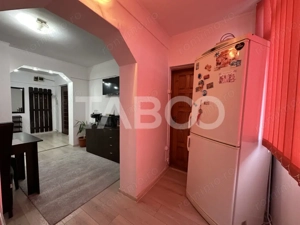 Apartament decomandat 3 camere 2 bai 68 mpu etaj 3 Calimanesti Valcea  - imagine 11