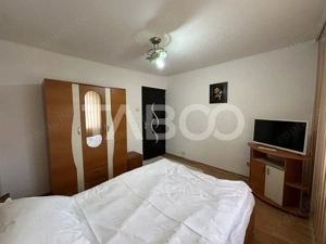 Apartament decomandat 3 camere 2 bai 68 mpu etaj 3 Calimanesti Valcea  - imagine 12